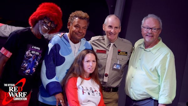 The cast with a fan